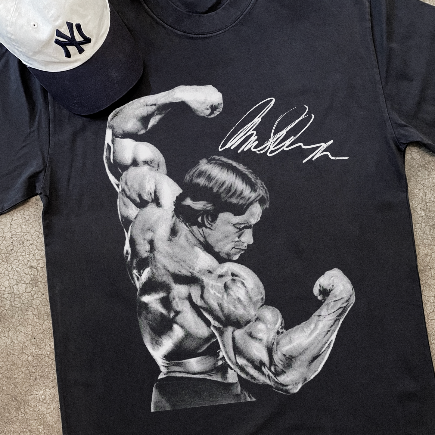 ARNIE 'FLEX' MR OLYMPIA HEAVYWEIGHT FADED BLACK T-SHIRT